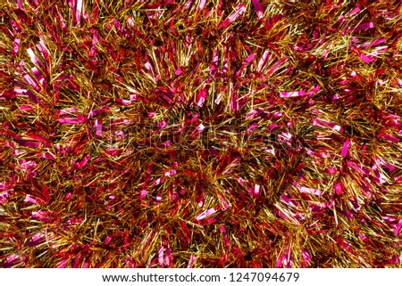 Pattern made from colorful tinsel, christmas decorations.
