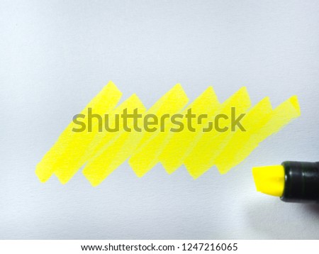 yellow line on paper, yellow highlighter on white paper background. Royalty-Free Stock Photo #1247216065