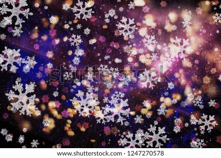 Abstract light celebration background with defocused golden lights for Christmas, New Year, Holiday, party 