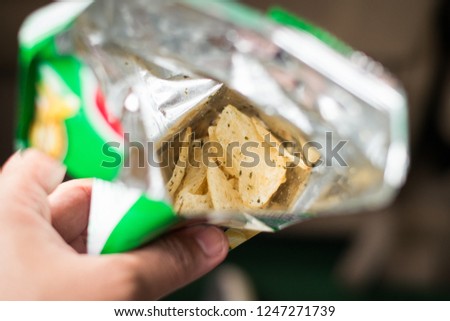 Ready made meals Potato chips snacks wrap at open ready to eat everytime.  Royalty-Free Stock Photo #1247271739