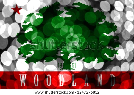 Woodland, California abstract blurry bokeh flag. Christmas, New Year and National day concept flag. United States of America.
