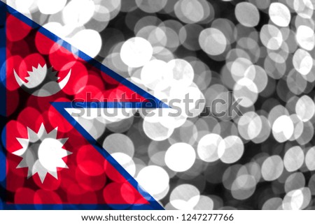 Nepal abstract blurry bokeh flag. Christmas, New Year and National day concept flag.