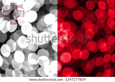 Malta abstract blurry bokeh flag. Christmas, New Year and National day concept flag.