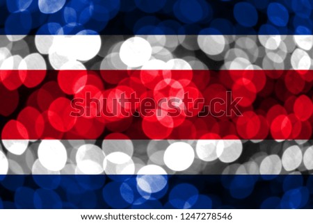 Costa Rica abstract blurry bokeh flag. Christmas, New Year and National day concept flag.