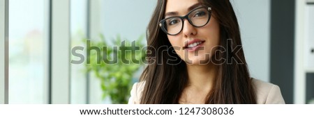 Beautiful smiling girl at workplace look in camera portrait. White collar dress code worker at workspace job offer modern office lifestyle client visit study profession boss market idea coach train.