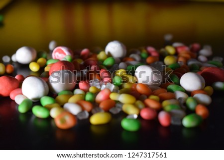 different colored sweets close up image