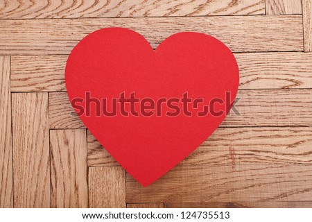 red paper heart on wooden background, valentines day theme