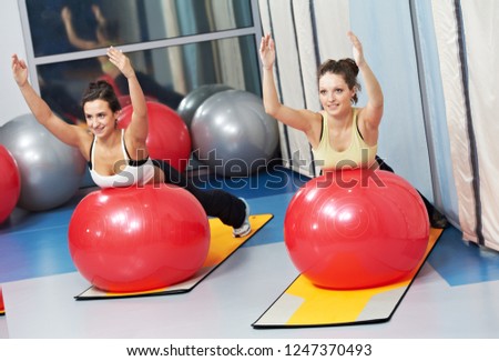 Fitness class. women doing exercise with fitness ball