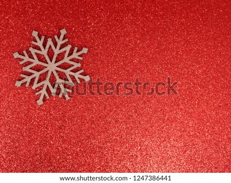 Christmas snowflake on red background