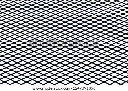 Mesh fence.It is a beautiful image suitable for making background images.