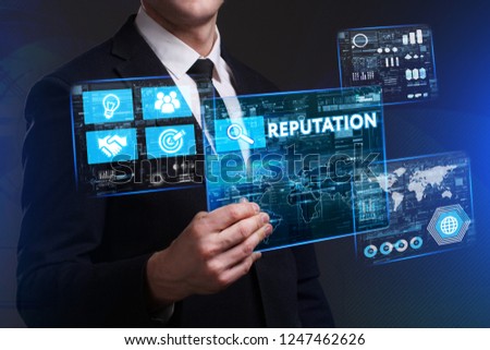 Business, Technology, Internet and network concept. Young businessman working on a virtual screen of the future and sees the inscription: Reputation Royalty-Free Stock Photo #1247462626