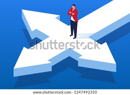 Businessman standing at the crossroads Royalty-Free Stock Photo #1247492350