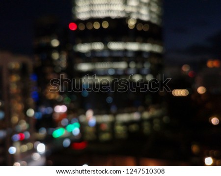 Beautiful colorful bokeh of the city skyline and streets at night time