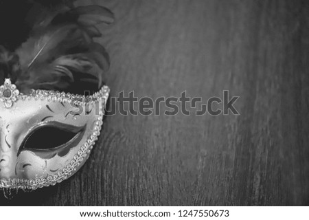 Venetian carnival mask on black background