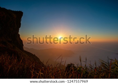 Phu Chi Fah a famous place in Chiang Rai province, Thailand with Sunrise 