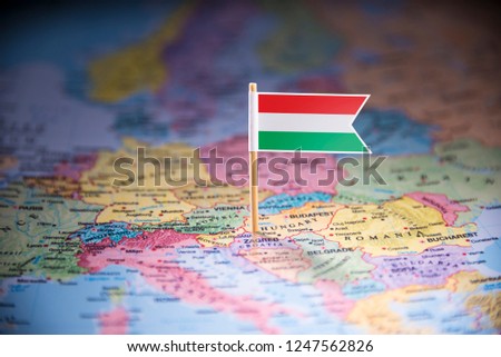 Hungary marked with a flag on the map