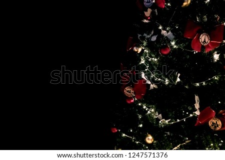 It's December, Christmas time - Decorative Lights of Christmas tree in the dark