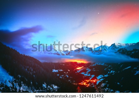 Night view on snowy peaks of Saint-Luc mountains, Alps Switzerland. Nature background 