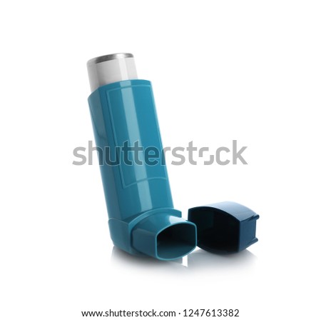 Portable asthma inhaler device on white background Royalty-Free Stock Photo #1247613382