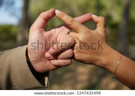 Love forever sign with fingers