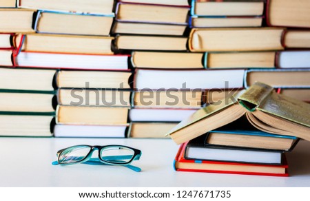 Many Books Piles, back to school background with copy space 