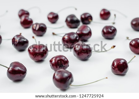  Cherries in white kitchen napkin 
White background Red Fresh. healthy food concept