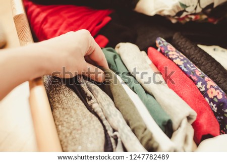 folded colorful clothes/toned photo