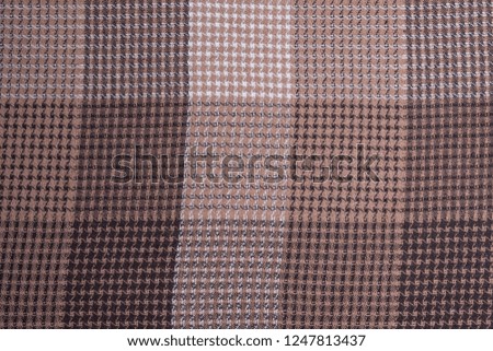 Background brown cloth. Texture plaid blankets.