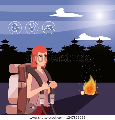 woman tourist with wood fire and set icons