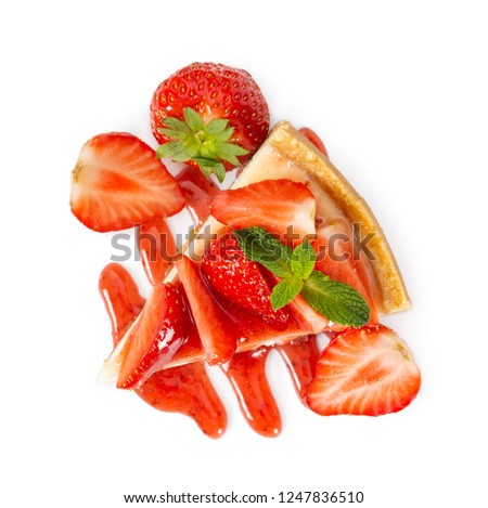 Piece of cheesecake with fresh strawberries and mint isolated on white background. Top view. Royalty-Free Stock Photo #1247836510