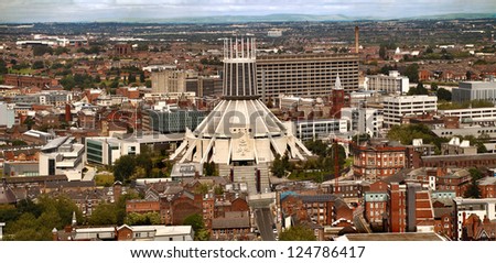 This view of Liverpool was taken from the top of the Church of England Cathedral and the Roman Catholic Cathedral stands in the centre of the picture.