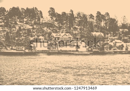 Matte background. Scandinavia. Winter landscape. Houses covered by snow on a riverbank with trees in the background. Black and White Photography. Vintage.