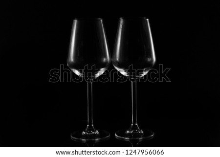  wine glasses on black background