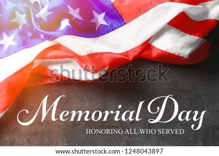 Text MEMORIAL DAY and USA flag on gray background. Honoring all who served