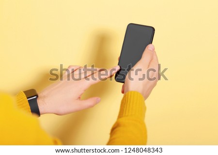 Close up of man using mobile smart phone