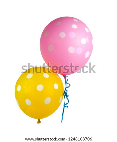 two balloons with white dots isolated on the white