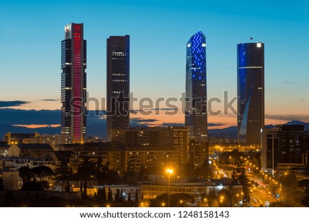 Madrid cityscape at night. Landscape of Madrid business building at Four Tower. Modern high building in business district area at Spain.