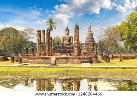 Wat Mahathat Temple in Sukhothai historical park, Thailand in a summer day Royalty-Free Stock Photo #1248204466