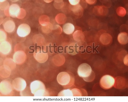 Abstract rose gold bokeh blurred background.