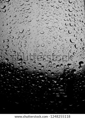 photo took when rainy day in the miror and created black and white silhouette