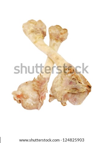 Two crossed bones taken closeup isolated on a white background.
