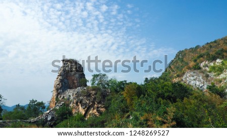 Scenic landscape over the mountain with blue sky background, Colorful of green trees and rock mountain at Kanchanaburi Province , Thailand  