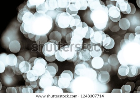 abstract bright blur white glitter as snow with flash light as panoramic background for Christmas day decoration concept