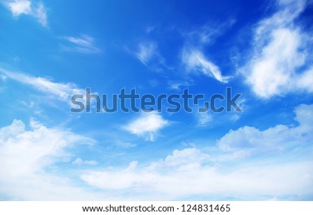 blue sky background with tiny clouds Royalty-Free Stock Photo #124831465