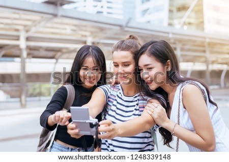 Teenager woman is making selfie photo together,Beautiful women and best friends,Happy and smiling