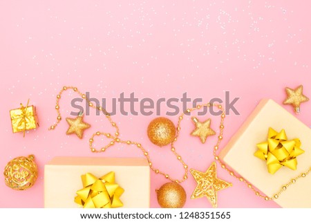 gifts boxes or presents boxes with golden bows, star and ball on pink background for birthday, christmas or wedding ceremony