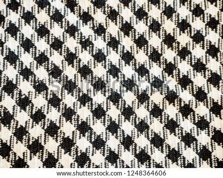 Arafat Scarve. Weaved texture of a material. Linen natural fabric, square pattern, close up. Silk pattern. Cotton weft or white yarn. Abstract texture. Vintage background of black and white elements