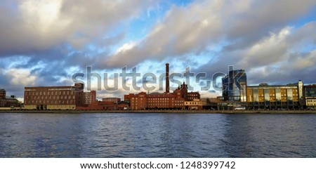 Old industrial complex of buildings by the river
