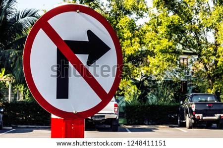Traffic signs and no right turn.