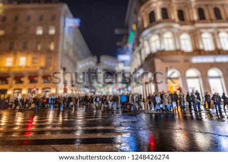 crowd of people walking on night Vienna streets, Christmas shopping